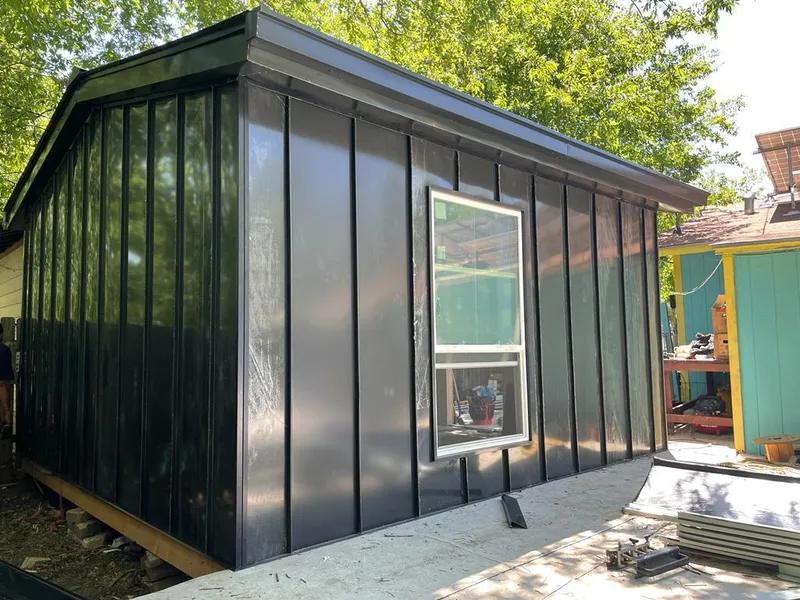 Black standing seam metal wall panels for Roof Inspection in Laurel